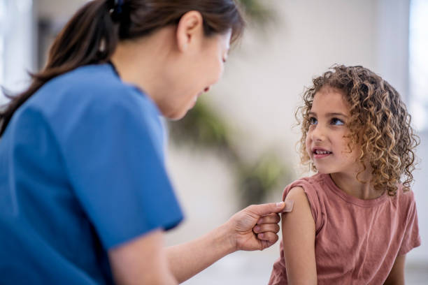 istock Paediatrician applying a bandage. 1150732699