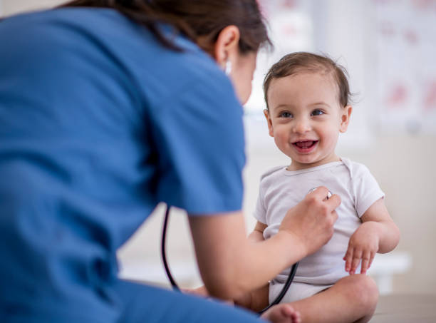 Doctor gives baby a checkup
