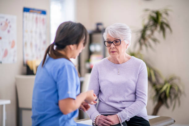 Sad senior woman at doctor's office