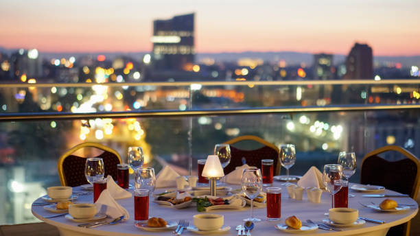 istock fancy sunset table on roof tea time 1150732931