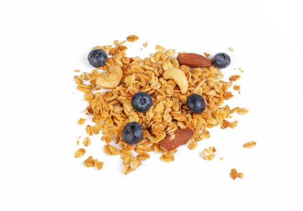istock Granola with dried fruits isolated on white 1150733271