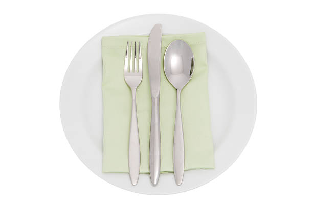 istock plate with cutlery and serviette 115073331