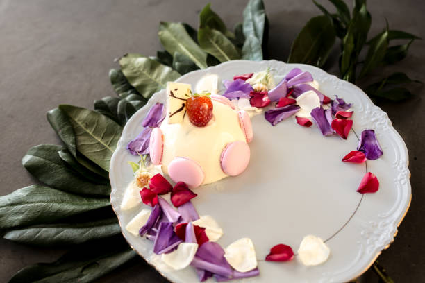 white chocolate cake with flowers and leaves