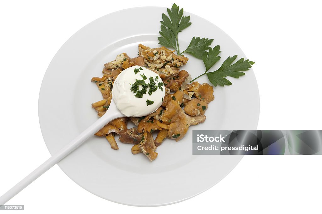 Mushroom food with chanterelles Mushroom food with chanterelles, vegetarian meal cooked with parsley Chanterelle Stock Photo
