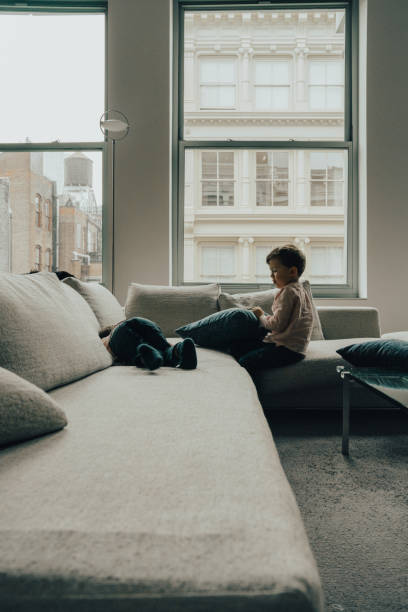 istock Little boys playing at home 1150735386