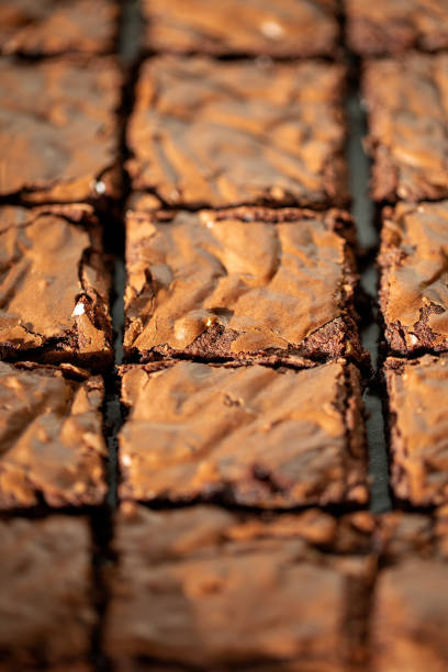 Chocolate brownies shot from above sliced square stock photo