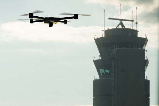 drone approaching the airport control tower