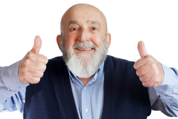 istock bald senior man with thumbs up 1150737879