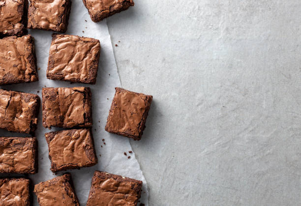 Chocolate brownies shot from above sliced square stock photo
