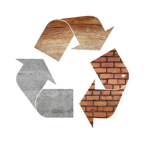 Photo of Recycling symbol of concrete, wood and bricks