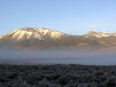 An early morning shot of a foggy Washoe Valley with Slide Mountain (left) and Mount Rose (right).