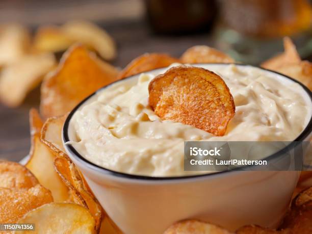 French Onion Dip With Hand Made Potato Chips Stock Photo - Download Image Now - Dipping Sauce, Dipping, Onion
