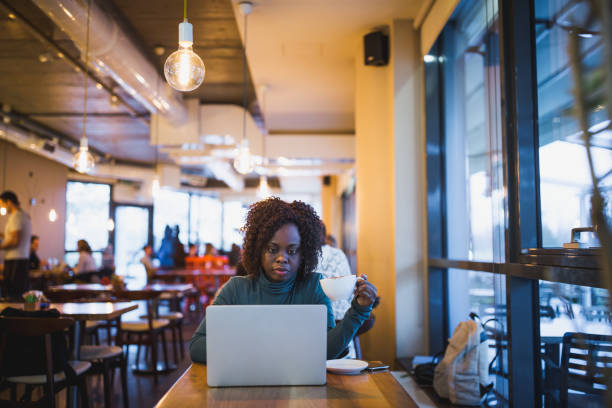 istock Young African female students on coffee break. 1150746489