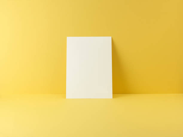 istock blank card flyer on yellow background with shadow 1150747512