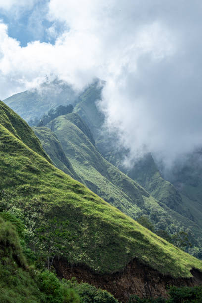 istock A lower part of Mount Rinjani showing lush green fields and a cloudy sky before rain on Lombok, Indonesia 1150749604