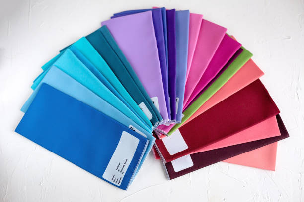 istock A Group of Twisted Colored Fabric on white 1150750438