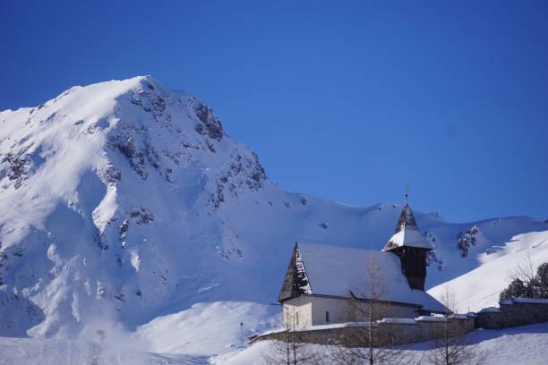 istock Mountain  and church 1150750576