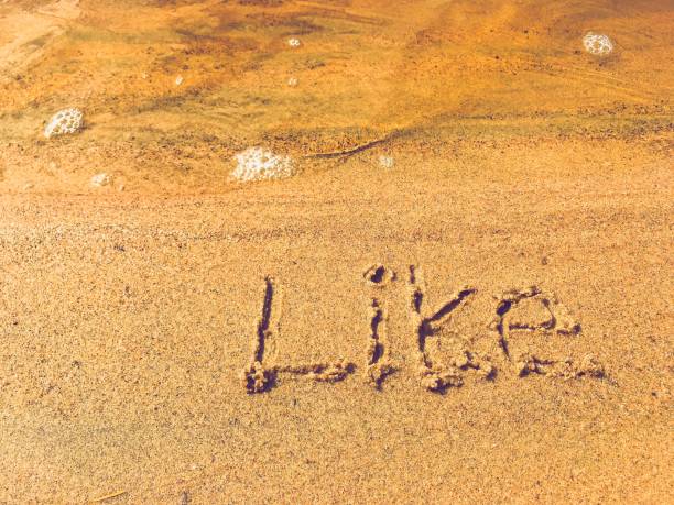 istock writing in sand. photo from Finland. 1150750610