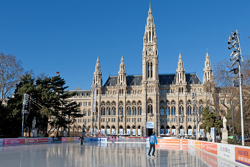 Vienna, Austria - February 5, 2011: The Viennese town government establishes yearly at the cold season a gigantic ice rink before the Viennese city hall, this year from the 21st of January to the 6th of March, 2011