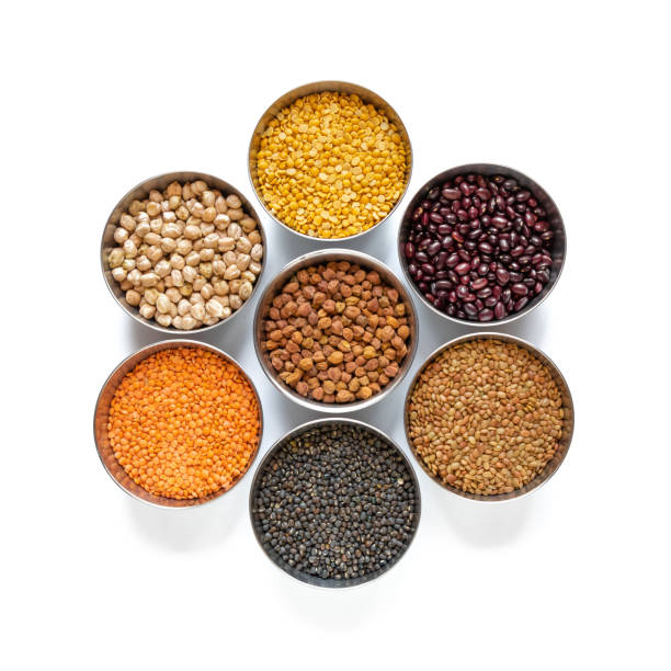 istock Legumes in steel bowel isolated on white background. 1150752414