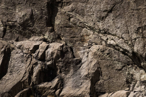 istock Background of stone wall texture rough rock surface 1150753902