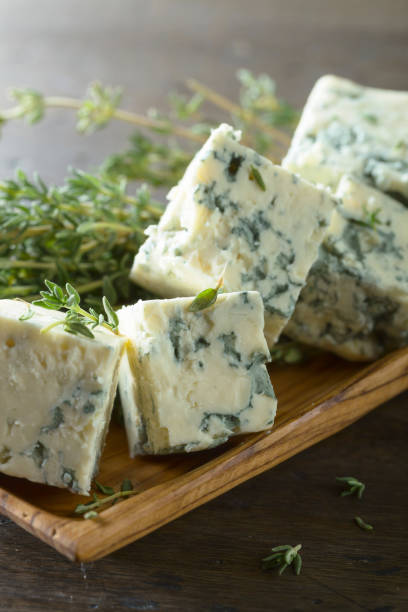 istock Blue cheese on a wooden table . 1150754317