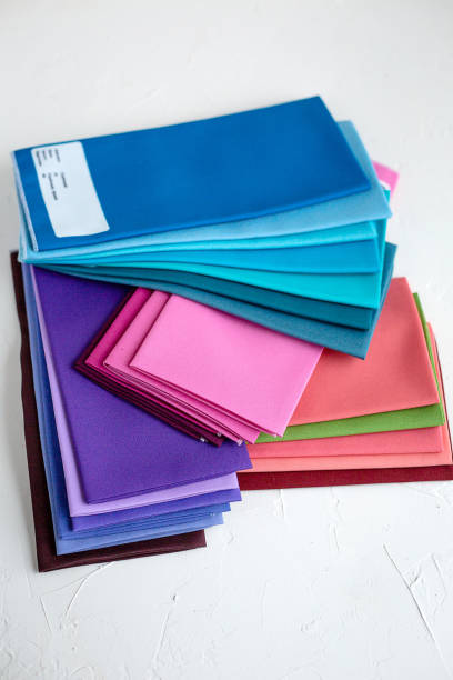 istock A Group of Twisted Colored Fabric on white 1150754628