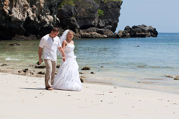 istock honeymoon on the beach 115075636