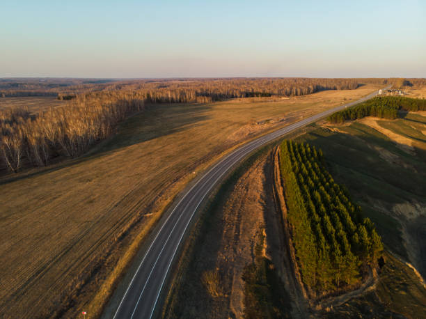istock Aerial view of a summer road 1150757004