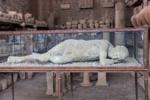 Petrified body find in ash  victim of the eruption of Mt Vesuvius in  Pompeii, Italy. pompeii, Italy. 04-22-2019. Petrified body find in ash  victim of the eruption of Mt Vesuvius in  Pompeii, Italy. victims the ruins of pompeii stock pictures, royalty-free photos & images