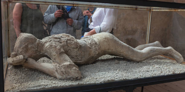 Petrified body find in ash  victim of the eruption of Mt Vesuvius in  Pompeii, Italy. pompeii, Italy. 04-22-2019. Petrified body find in ash  victim of the eruption of Mt Vesuvius in  Pompeii, Italy. victims the ruins of pompeii stock pictures, royalty-free photos & images