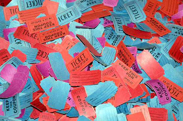 A pile of drawing tickets awaits selection.