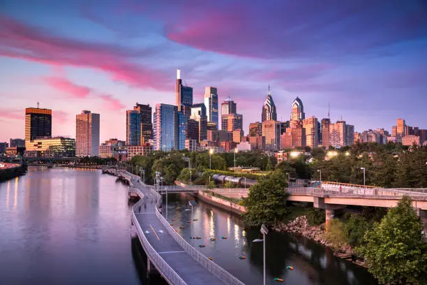 Downtown city skyline view of Philadelphia Pennsylvania USA over the Schuylkill River and boardwalk