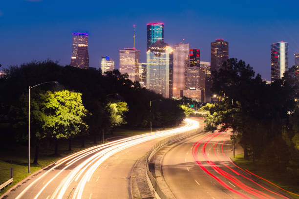 istock Houston Texas City Skyline Over Highway at Night 1150764746