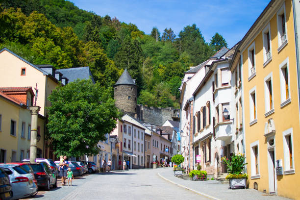 Typical street in the old town of Vianden, in Luxembourg, Europe, with colorful houses Typical street in the old town of Vianden, in Luxembourg, Europe, with colorful houses. vianden stock pictures, royalty-free photos & images
