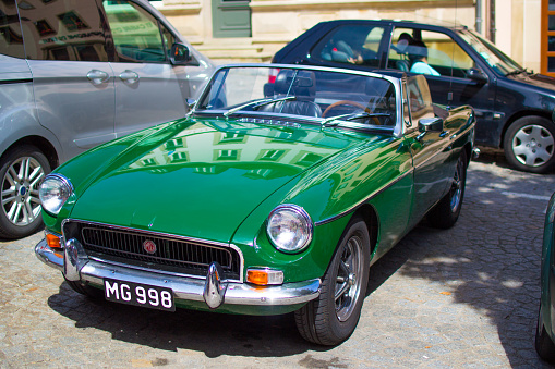 Vianden, Luxembourg; 08/12/2018: green MG MGB, an vintage old classic sport car.