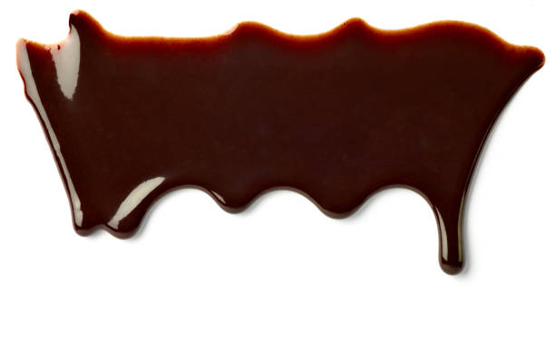 istock chocolate syrup dessert food sweet leaking drop 1150767811