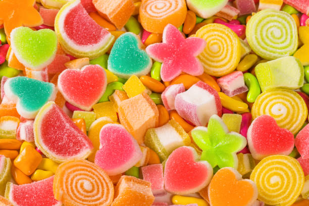 istock Colourful sugary candy, Assort various sweet candies  background 1150767814
