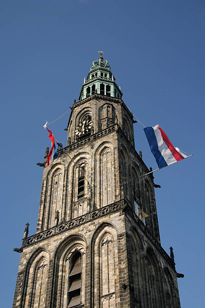 istock Martinitower with dutch union flags on liberation day 115076873