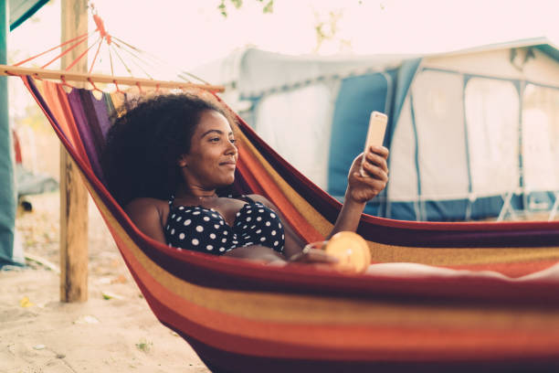 istock Relaxed woman in hammock 1150771541