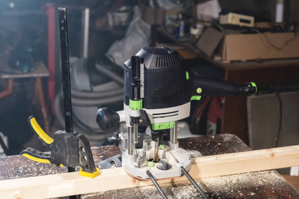 istock Close-up electric router milling machine in a dark room 1150771730
