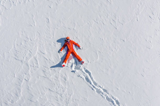 istock ski woman snow angel from above 1150772859