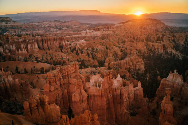 istock Sun rises over rock formations in the desert 1150773421