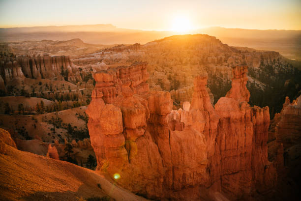istock Sun rises over rock formations in the desert 1150773479