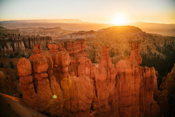 istock Sun rises over rock formations in the desert 1150773481