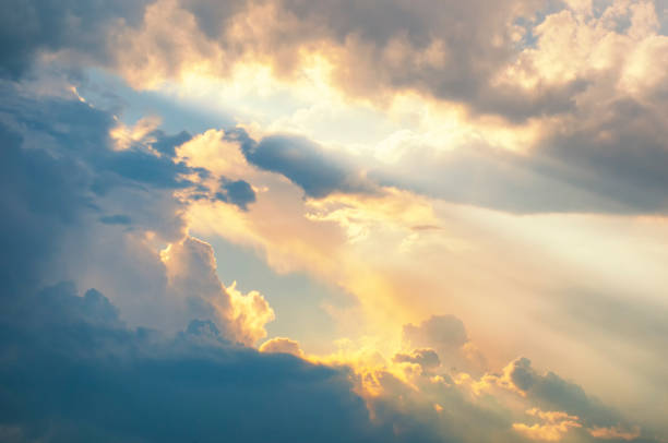 istock Beautiful evening cloudy sky. Pink warm clouds at the sunset. Colorful background 1150774539