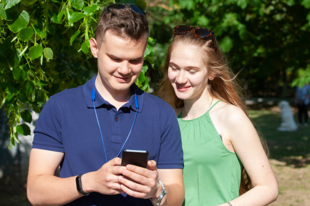 istock Happy young couple having fun outdoors together 1150774710