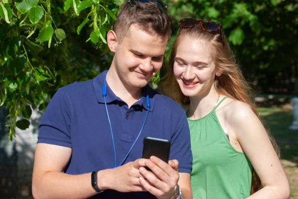 istock Happy young couple having fun outdoors together 1150776076