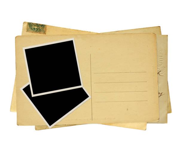 istock Old post cards and old photo. Isolated on white background 1150776797