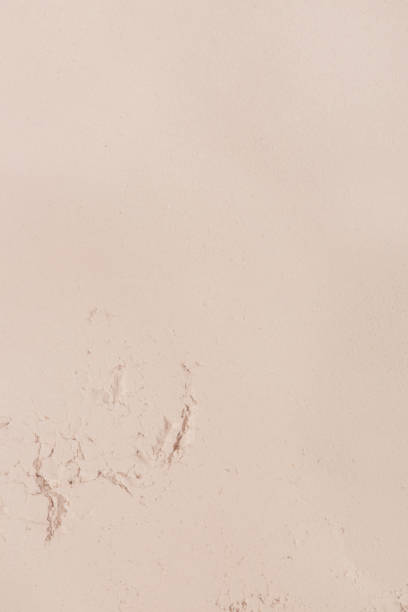 istock Cosmetic clay powder textured background, close up 1150779480